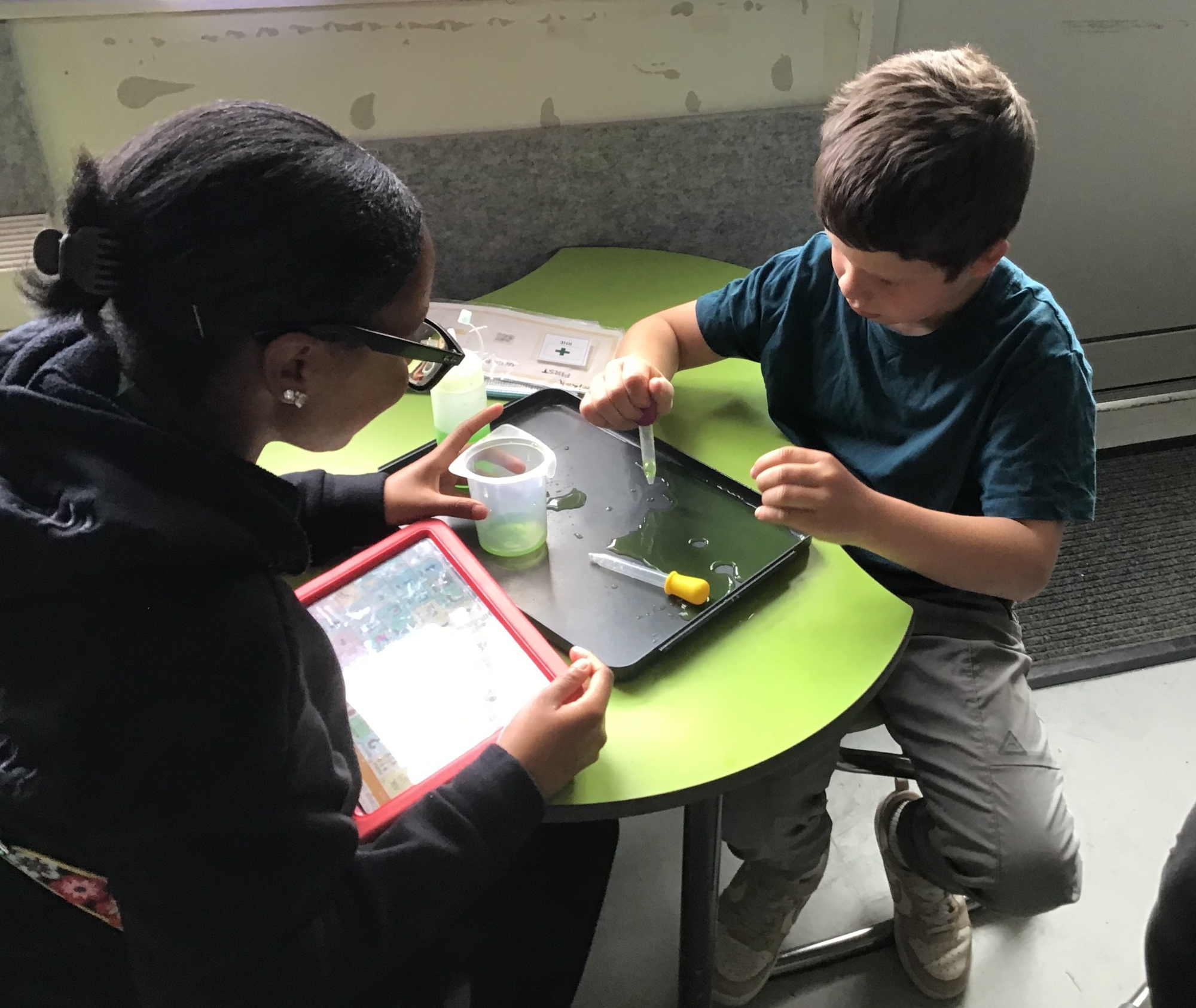 Pupil taking part in a science lesson 