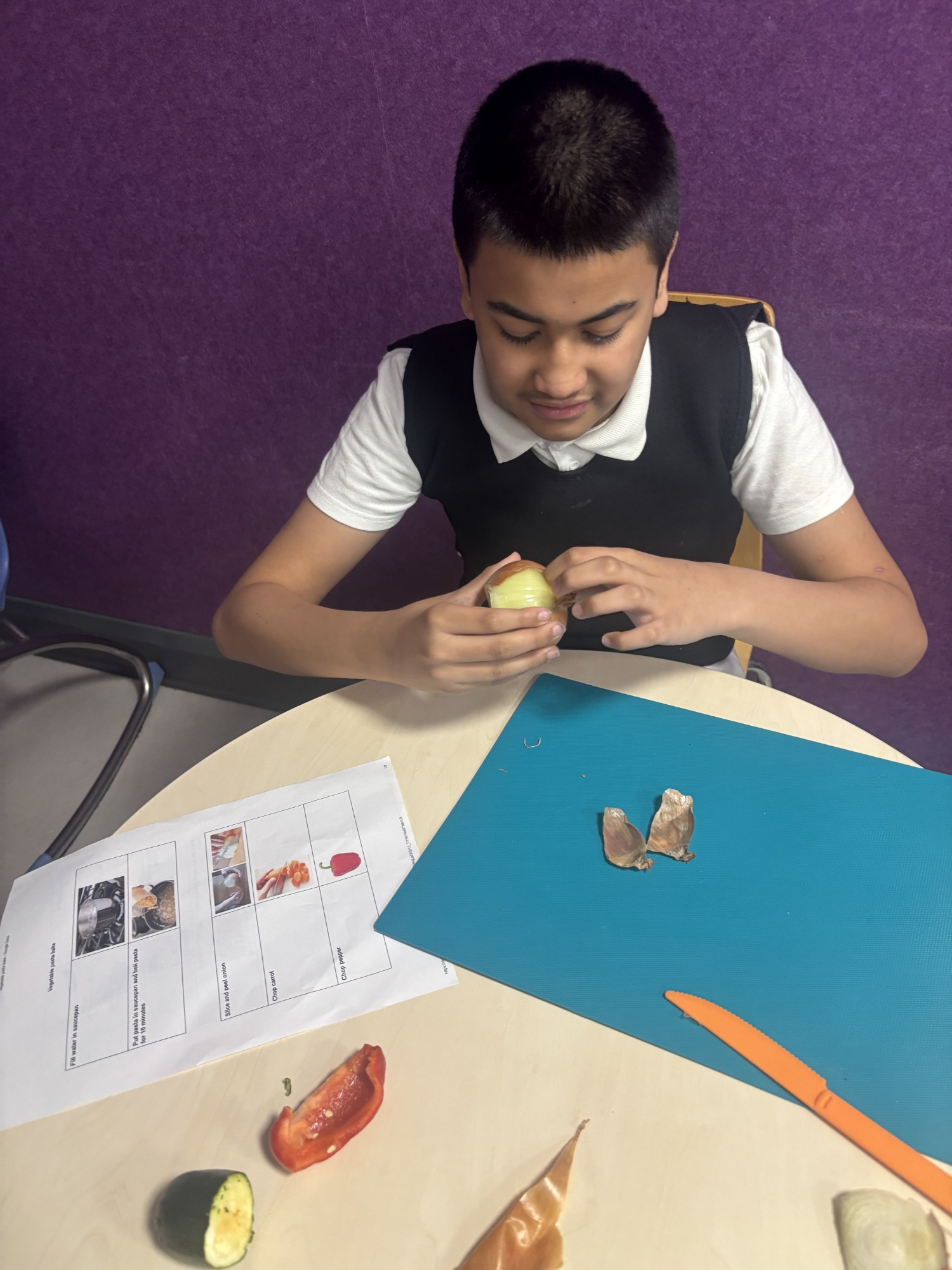 Pupil peeling fruit and vegetables 