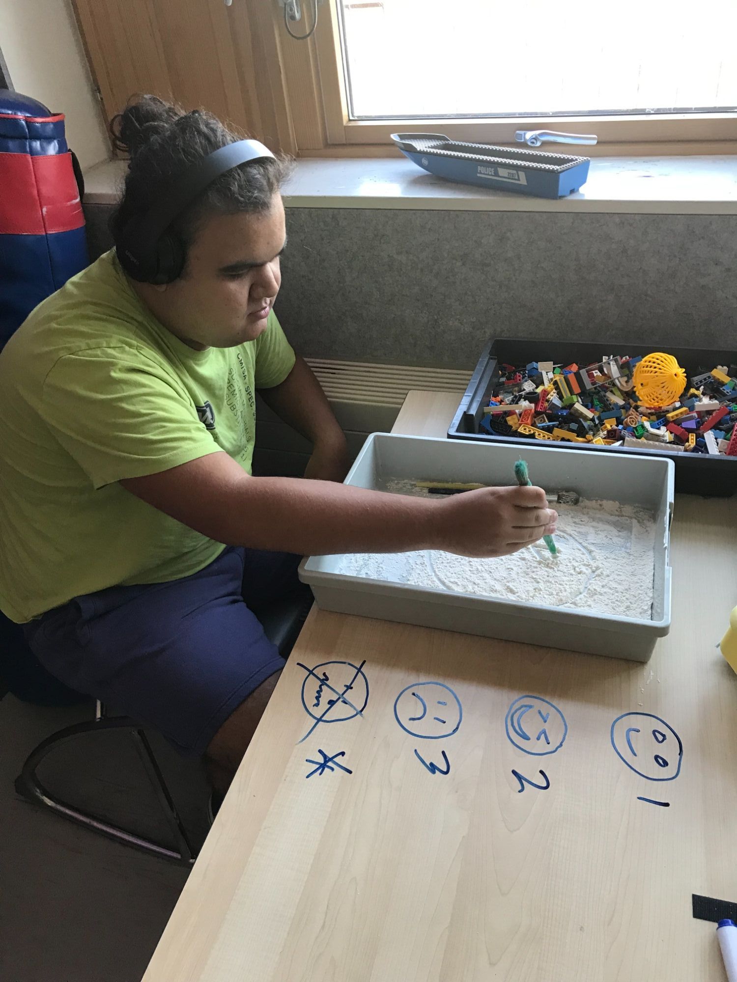 Pupil mark making in sand