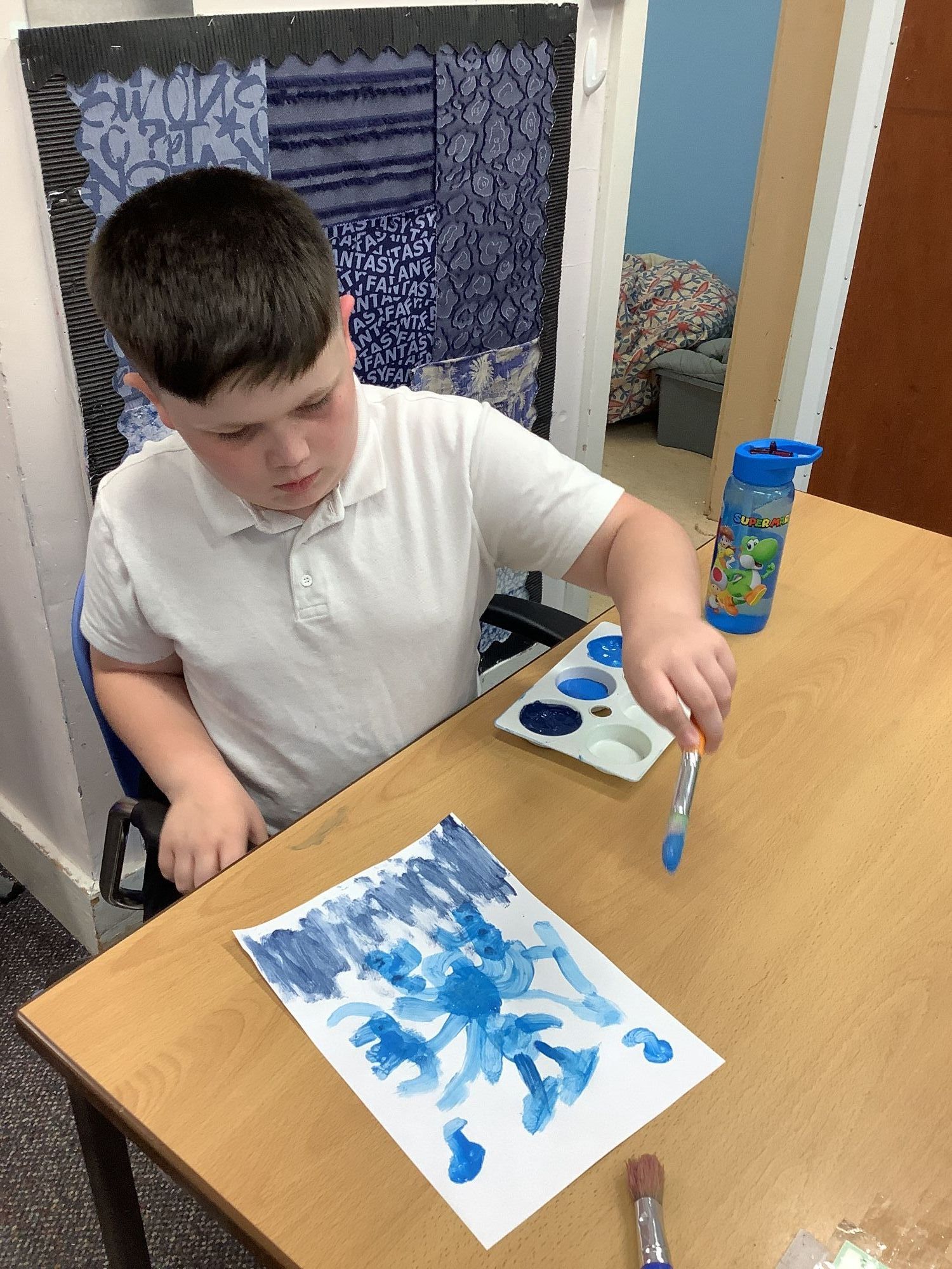 Pupil painting a picture 