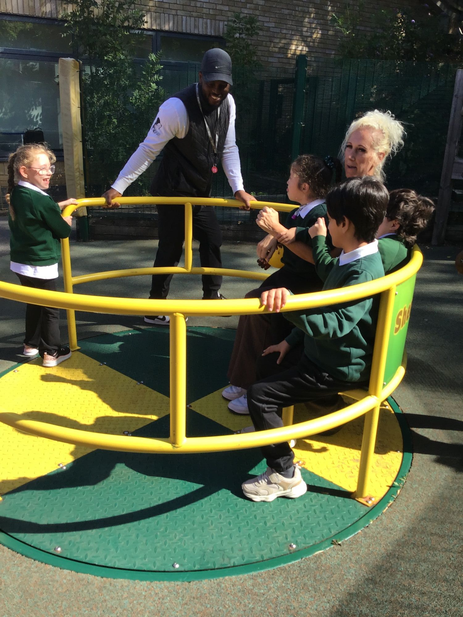 Pupils on a round about 