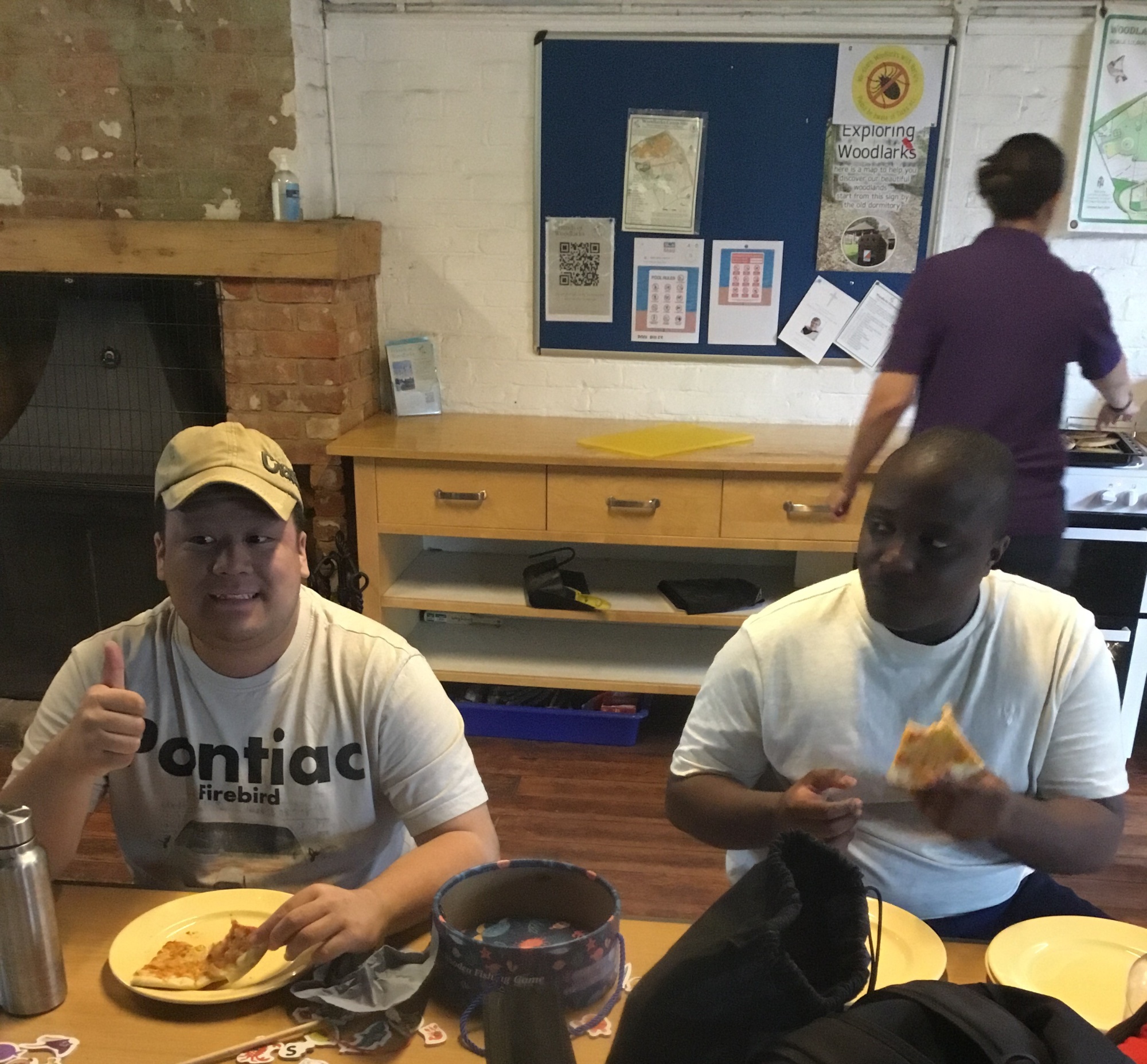 Pupils eating on residential trip 