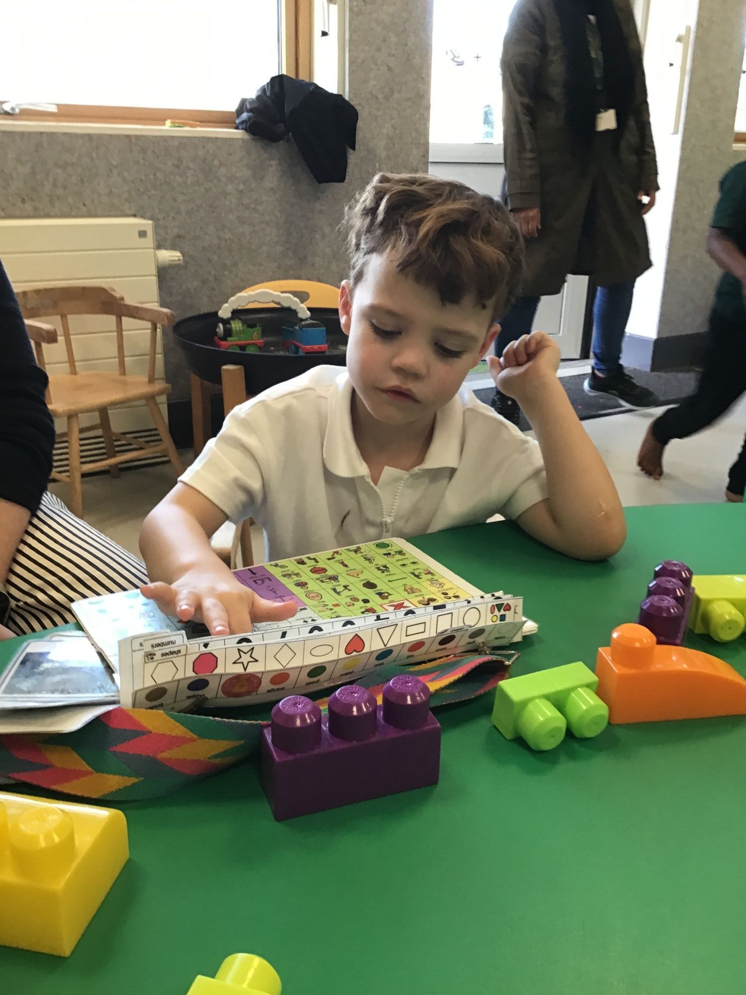 Pupil using a core board to communicate