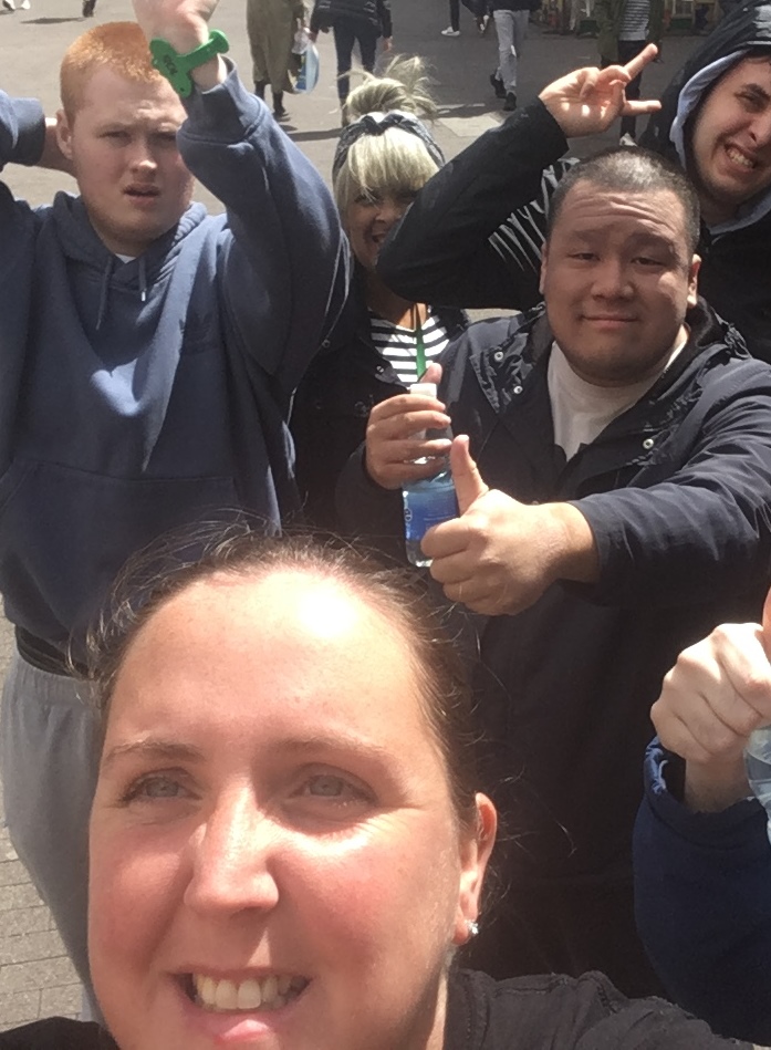 Selfie of group of pupils and staff in the community 